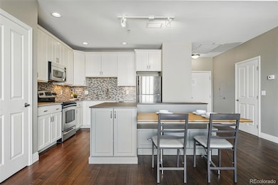 Kitchen with built in banquette eating eating area.