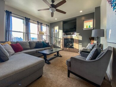 Living Room with gas fireplace and large windows