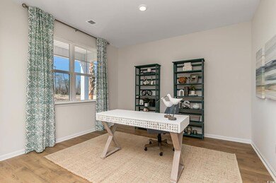 Office featuring hardwood / wood-style floors