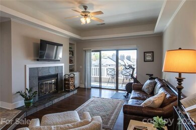 Wood Burning Fireplace with Stone Accents and Buil