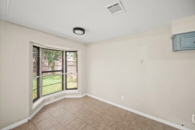 Dining area features ample natural light and a pic
