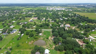 This aerial photo showcases a lush, green rural ar