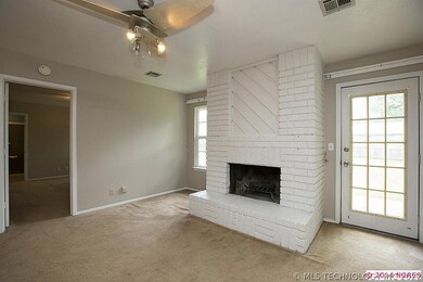 French door leads to backyard patio.