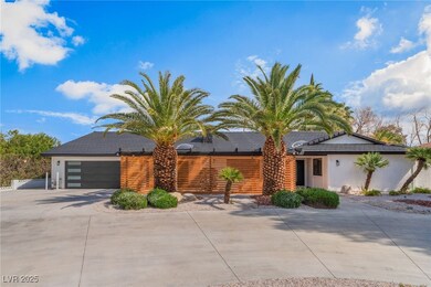 View of front of property featuring an attached ga