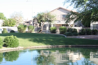 Backview greenbelt w/fish-stocked lake