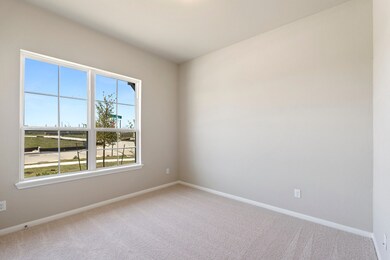 Your secondary bedroom features plush carpet, fres