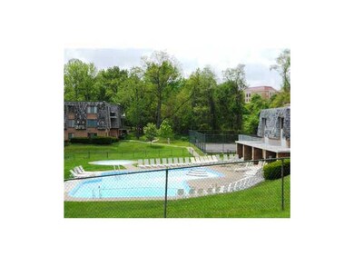 Exterior Front. Swimming pool and club house