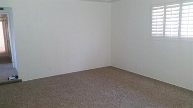 living room with new paint and carpet