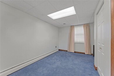 den or sitting room on main level. baseboards are