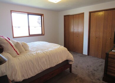 Double closets, full bathroom.