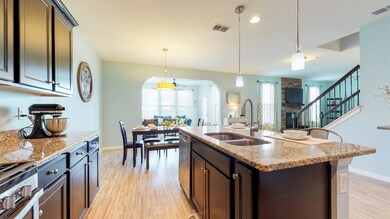 The kitchen leads into the Florida room 