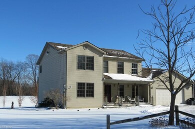 This home sits on a 2.3 acre country lot with well