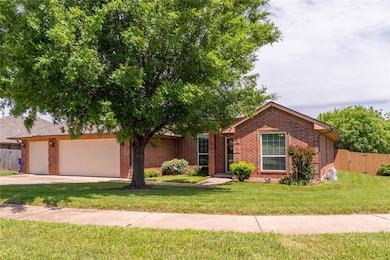 View of front of property with brick siding, drive