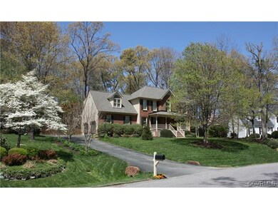 Street View-terrific landscaping. Extra wide drive