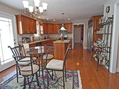 Kitchen. The hardwood floor flows through to the k