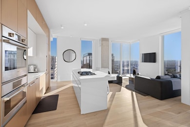Kitchen with modern cabinets, light wood-style fl