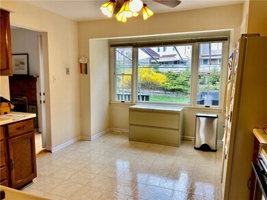 Kitchen has room for island, and table and chairs.