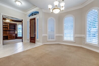 Dining room to front door and study.