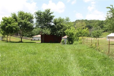 Fenceline pictured here marks property line of original McNelly family farmhouse