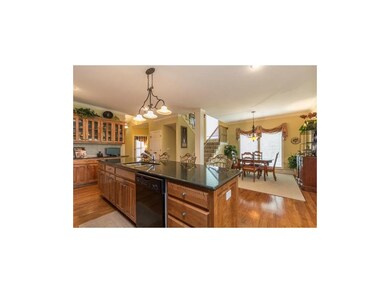 Gleaming Hardwood Floors in Entry, Kitchen, Breakf
