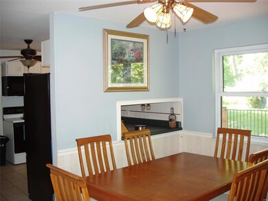 Dining room has convenient serving pass-thru from/