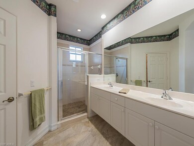 Master Bath with New Flooring Including in Shower