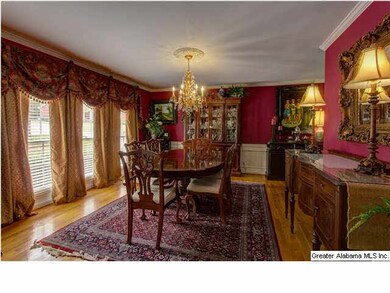 Very large dining room with hardwood floors crown 