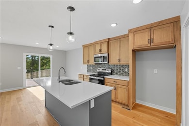 701 Glenn Cir, Raymore, MO 64083 - photo 2