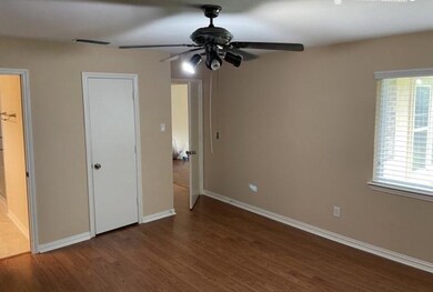 Unfurnished bedroom with multiple windows, ceiling