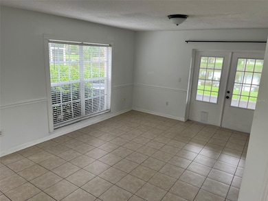living room, exit to lanai