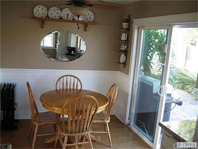 Dining area overlooking the beautiful  rear yard