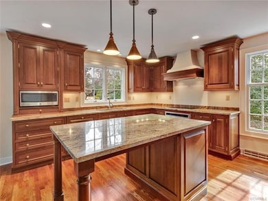 Light-filled, fully-renovated kitchen! Fresh paint on walls & trim