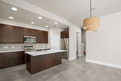 Kitchen featuring stainless steel appliances, a s