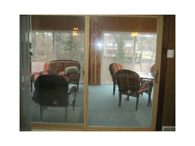 Other. Three seasons room off of living room...sli