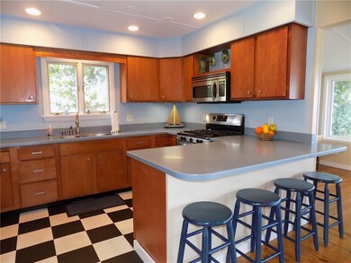 Tons Of Cupboards & Corian Counters.