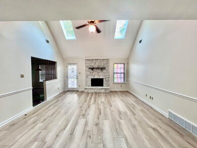 Unfurnished living room featuring light wood-type 