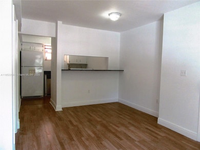 Dining area with passthrough from kitchen.