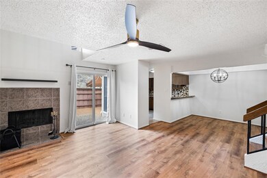 Updated light fixtures, and wood like flooring, Op