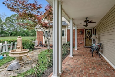Wraparound Porch and Fountain