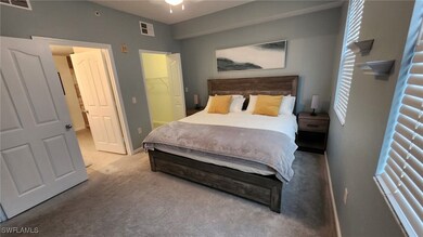 Bedroom featuring visible vents, baseboards, and c