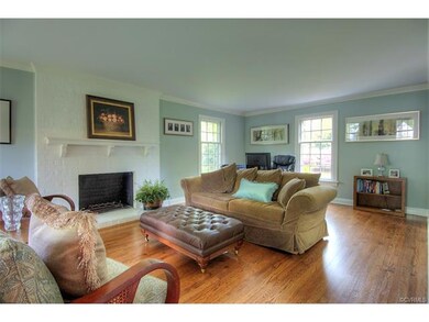 The formal living room has plenty of natural light