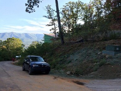 View toward the south. Lot is up above vehicle