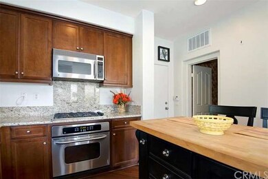 Beautifully appointed kitchen with gleaming stainl