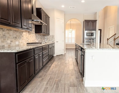 Kitchen space is open with an abundance of direct