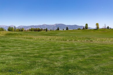 The large one plus acre lot backs to open space an