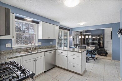 The kitchen offers granite countertops, double ove