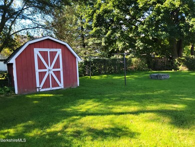 Nice back yard with shed & firepit