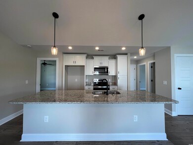 Kitchen with appliances with stainless steel finis
