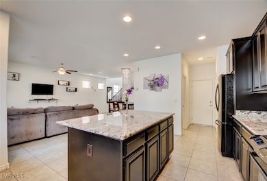 Kitchen featuring stainless steel electric range,