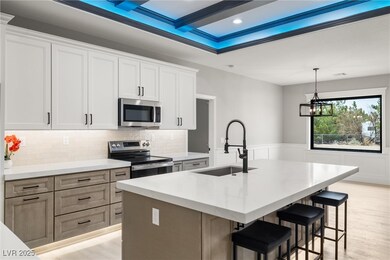 Kitchen & dining room featuring wainscoting and a